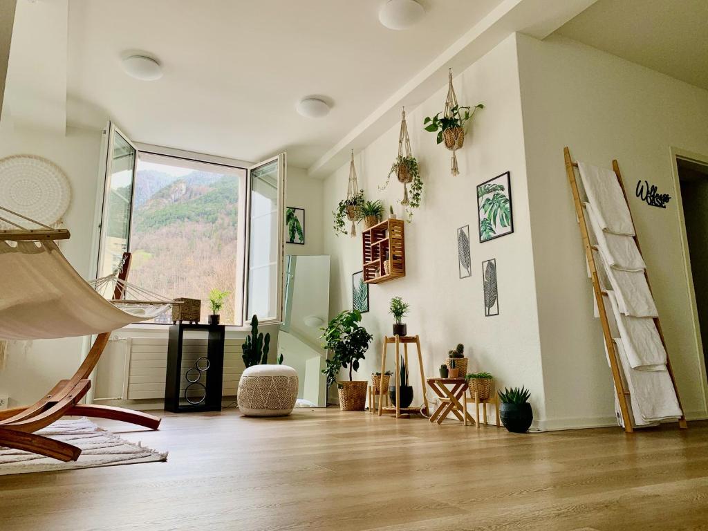Posezení v ubytování EVA o Wellnessoasis o Montainview o Pizzaoven o