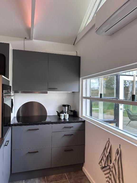 Kuchyň nebo kuchyňský kout v ubytování Enø / Karrebæksminde, Strandrylevej 31