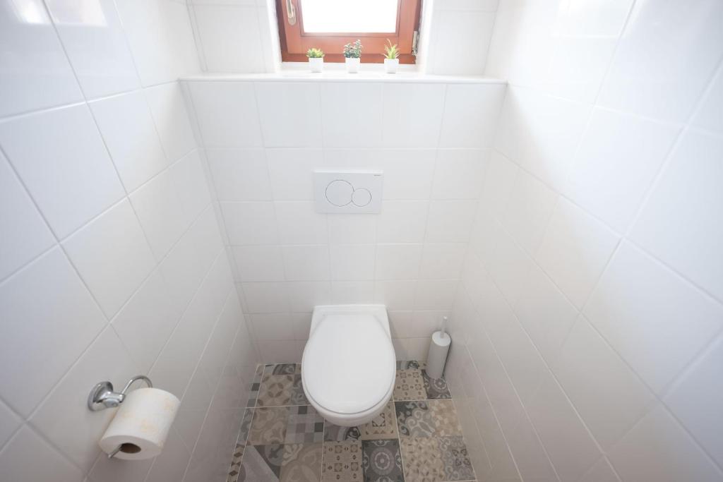 Koupelna v ubytování PAPI Apartmán