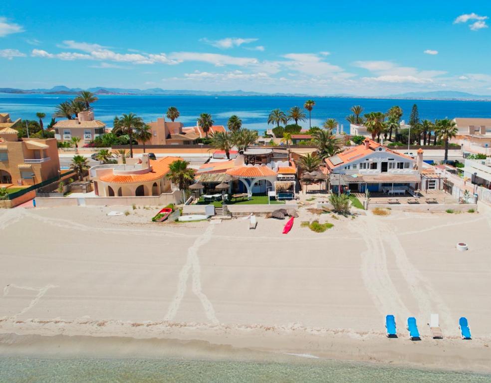 an aerial view of the beach at the resort at 3aguas Mediterraneo in La Manga del Mar Menor
