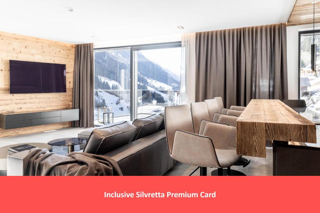 a conference room with a table and chairs at Hollywood Dream Penthouse with private Sauna close Ischgl in Kappl