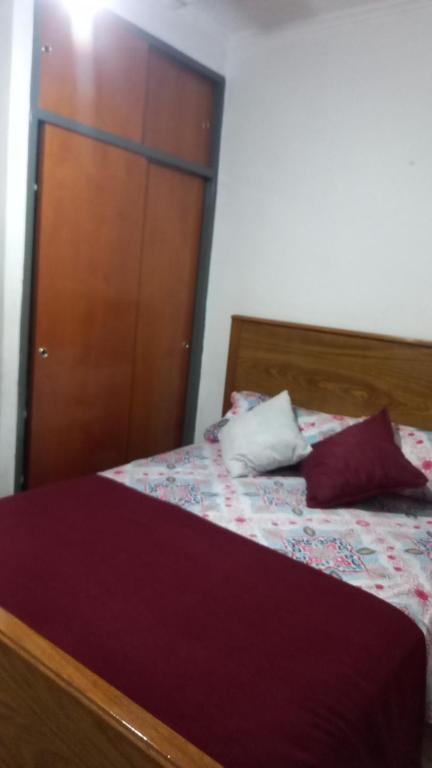 Ένα ή περισσότερα κρεβάτια σε δωμάτιο στο Apartamento en alquiler temporario en Buenos Aires