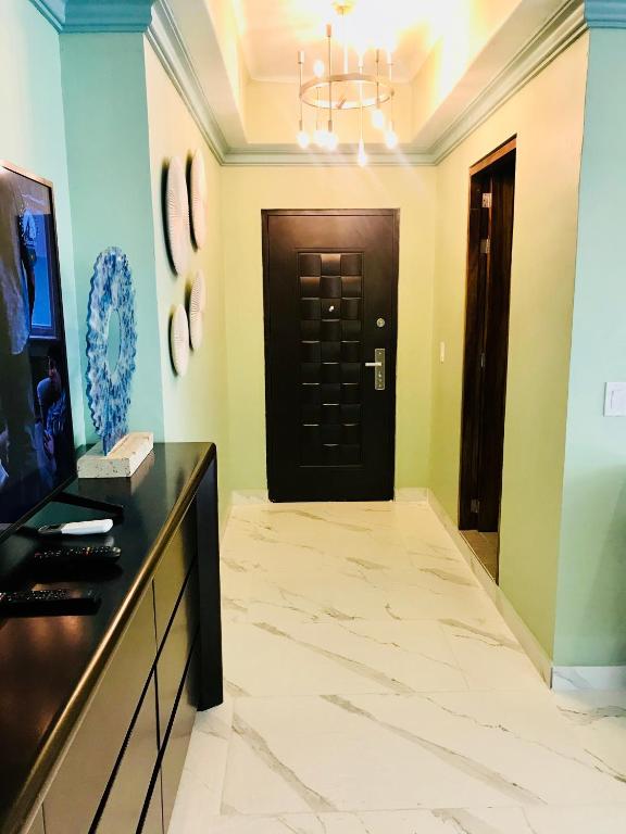 TV a/nebo společenská místnost v ubytování South Shore Villa Armonia Luxury Boutique