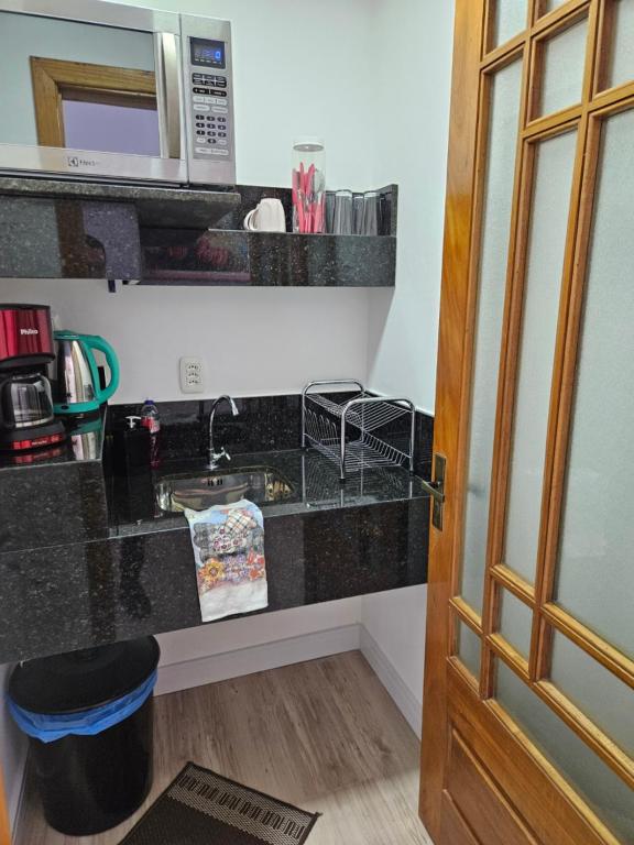 Kuchyň nebo kuchyňský kout v ubytování Pousada Lugama