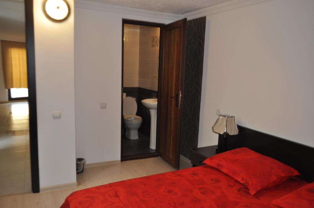 Postel nebo postele na pokoji v ubytování Guest House Mtskheta