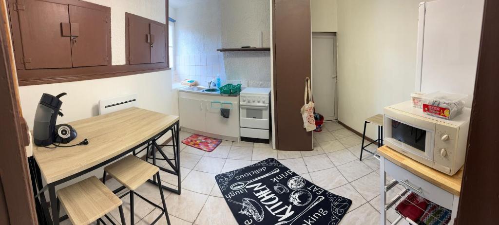 Η κουζίνα ή μικρή κουζίνα στο Appartement 5 pièces à 15 minutes du lac du Der