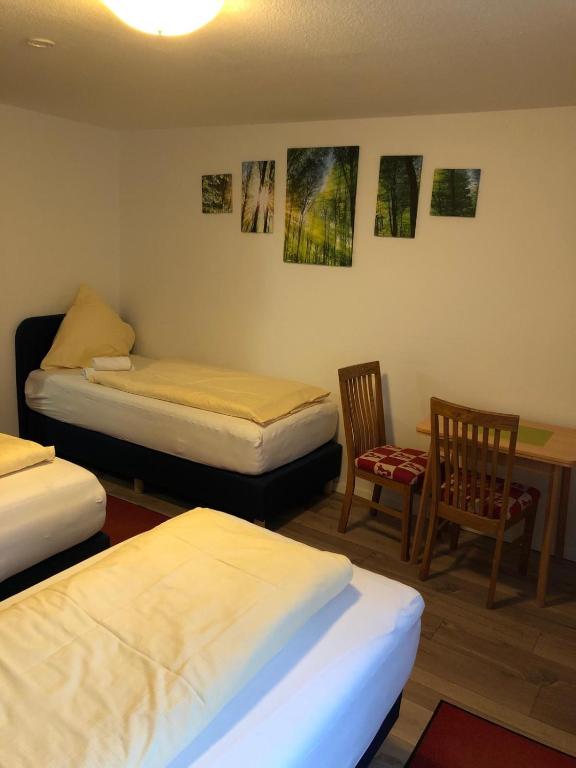 Postel nebo postele na pokoji v ubytování Gasthaus Hotel Löffelschmiede