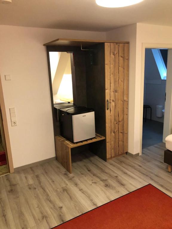 TV a/nebo společenská místnost v ubytování Gasthaus Hotel Löffelschmiede