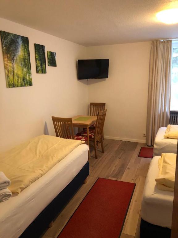 Postel nebo postele na pokoji v ubytování Gasthaus Hotel Löffelschmiede