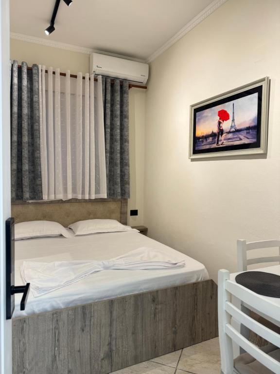 Postel nebo postele na pokoji v ubytování VILA Eljus