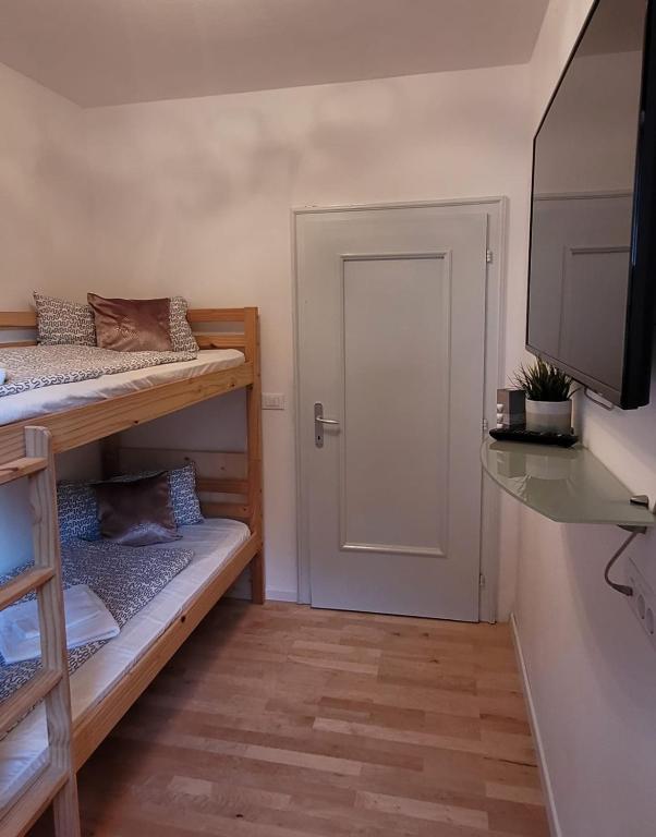 Postel nebo postele na pokoji v ubytování Apartment Oberprisch