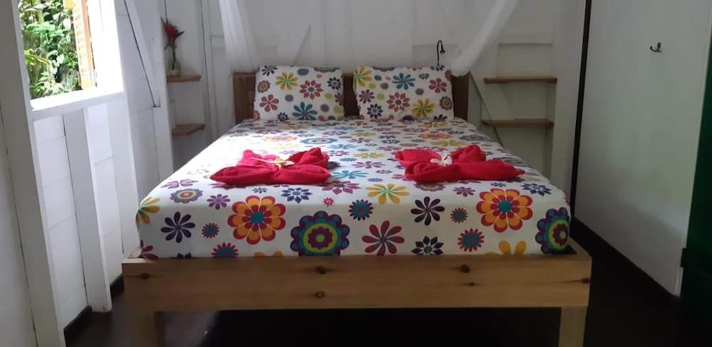 Postel nebo postele na pokoji v ubytování Carmen's place