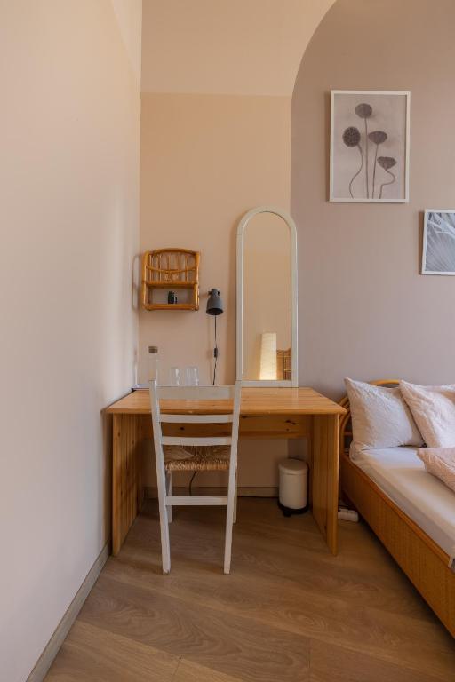 A bed or beds in a room at Gellerico Rooms at Rákóczi Square