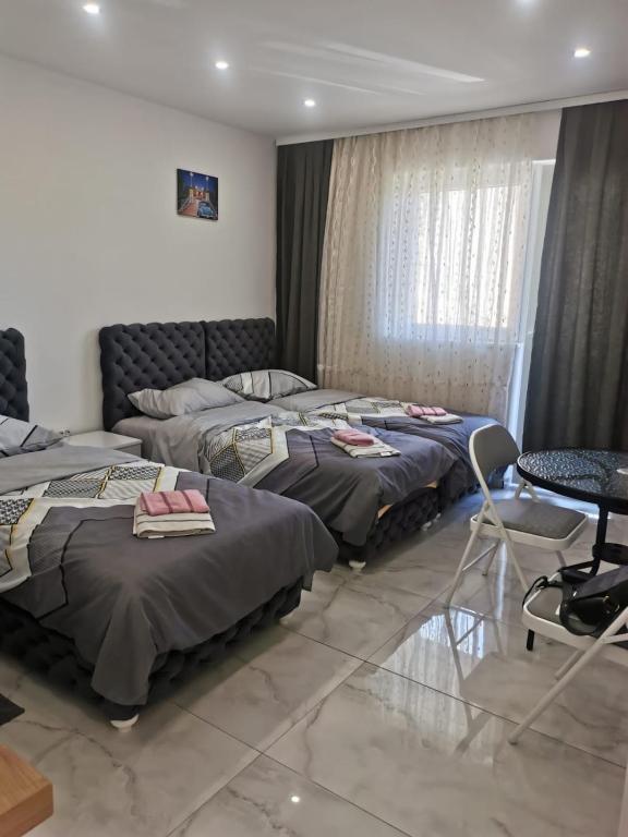 Postel nebo postele na pokoji v ubytování Apartman Aleksandar 1