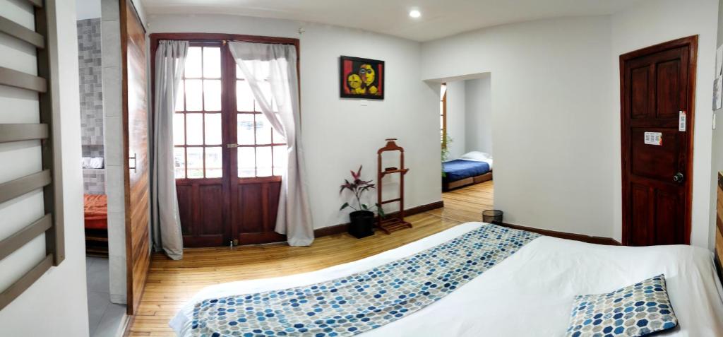 Postel nebo postele na pokoji v ubytování Minka Hostel