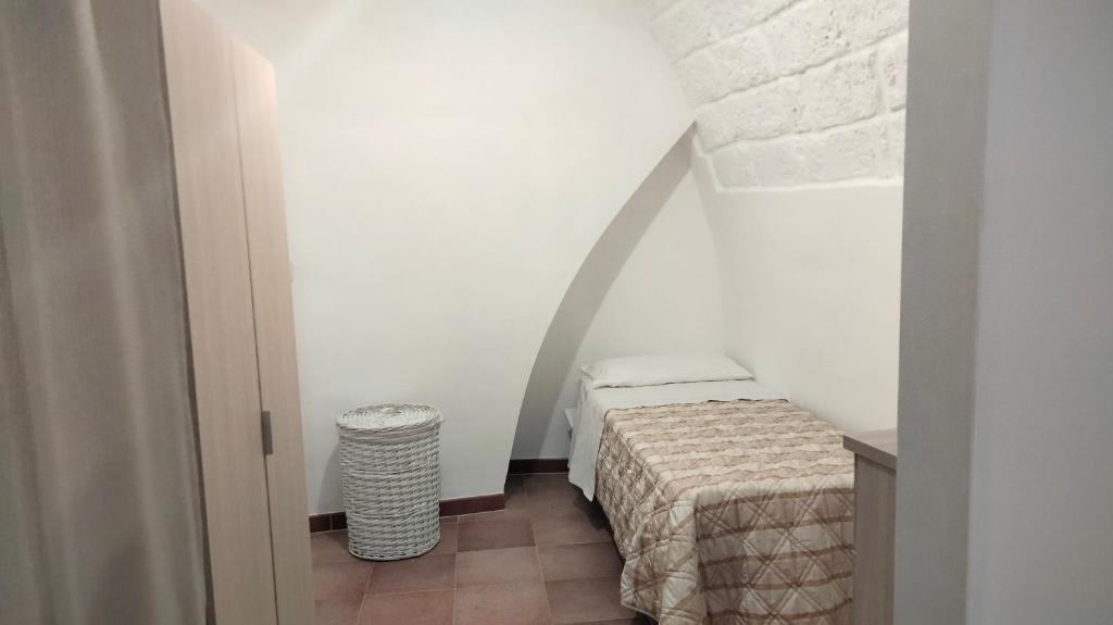 Кровать или кровати в номере Perla Marina Casa vacanze