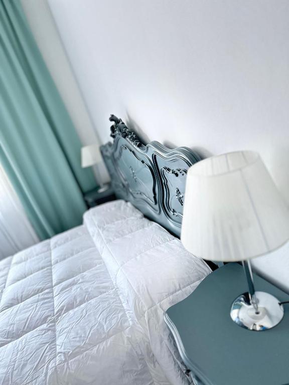 Postel nebo postele na pokoji v ubytování Casa di Maya