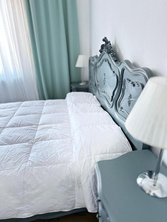 Postel nebo postele na pokoji v ubytování Casa di Maya