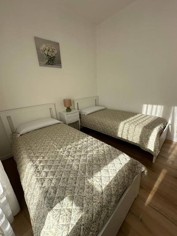 Postel nebo postele na pokoji v ubytování Casa di Maya