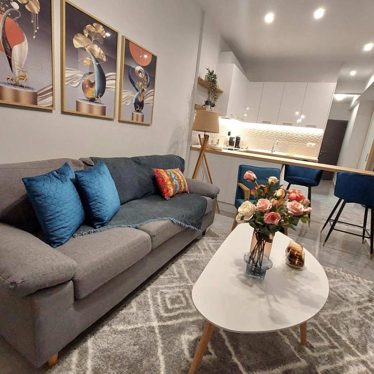 Posezení v ubytování DELTA-Central Elegant Apartment by Optimum Link