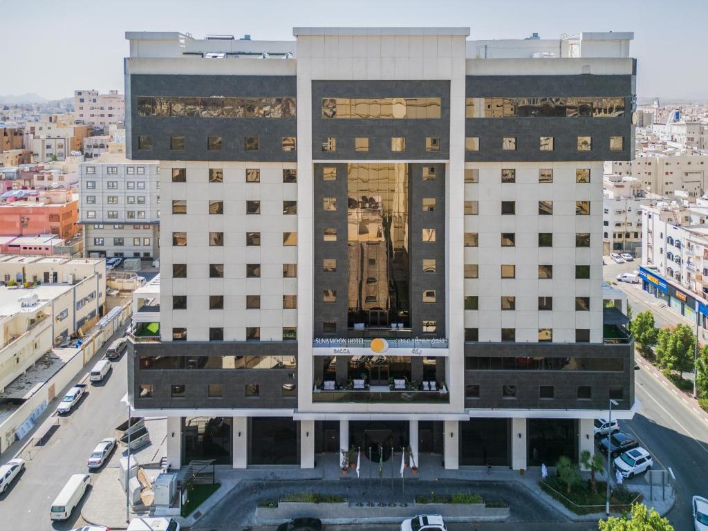 an aerial view of a building in a city at Sun & Moon Bacca Hotel in Makkah