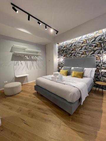 Ένα ή περισσότερα κρεβάτια σε δωμάτιο στο CENTRAL SUITE CINQUE TERRE - Riomaggiore e Manarola
