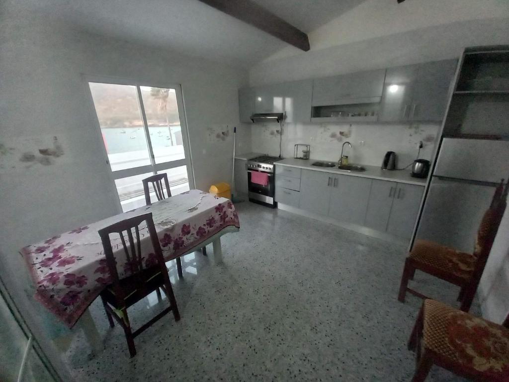 Kuchyň nebo kuchyňský kout v ubytování Casa Herminia