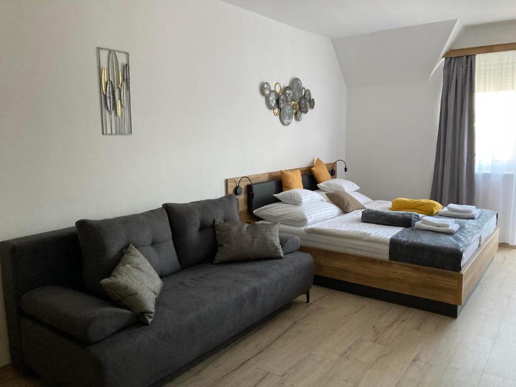 Istumisnurk majutusasutuses D&D Wellness Apartmanok - Dávid Wellness Apartman