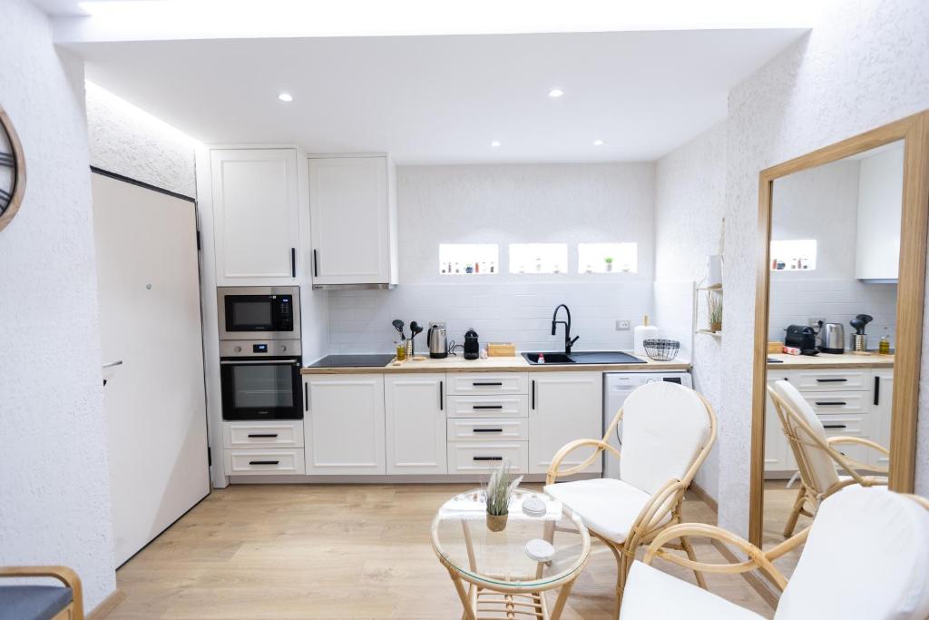 Kuchyň nebo kuchyňský kout v ubytování Boho Central Apartment