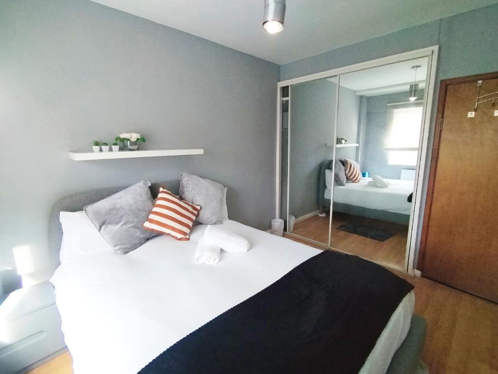 Postel nebo postele na pokoji v ubytování Central London rooms EC1V