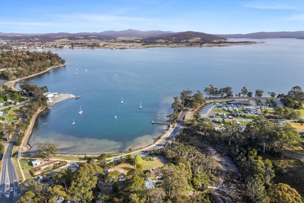an aerial view of a lake with boats in it at Tasman Holiday Parks - St Helens in St Helens