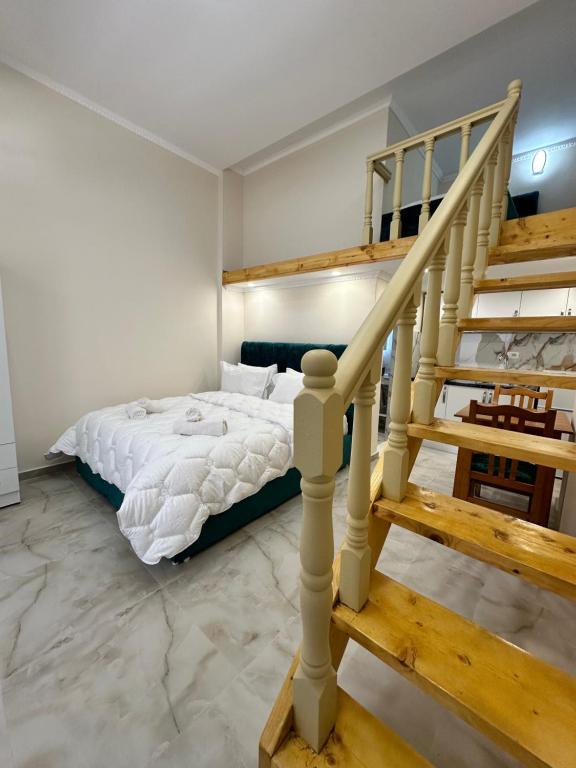 Postel nebo postele na pokoji v ubytování Troy ApartHotel Durres