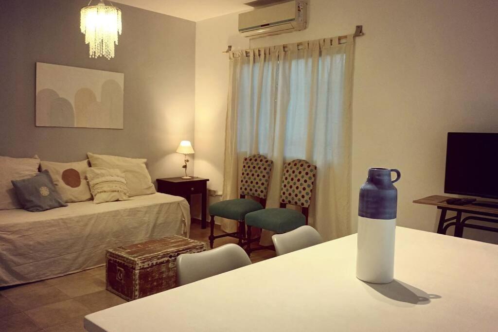 Giường trong phòng chung tại Hermoso departamento de la Ciudad de Mendoza
