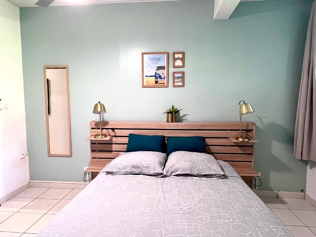 Postel nebo postele na pokoji v ubytování Appartement Le Colibri avec jacuzzi