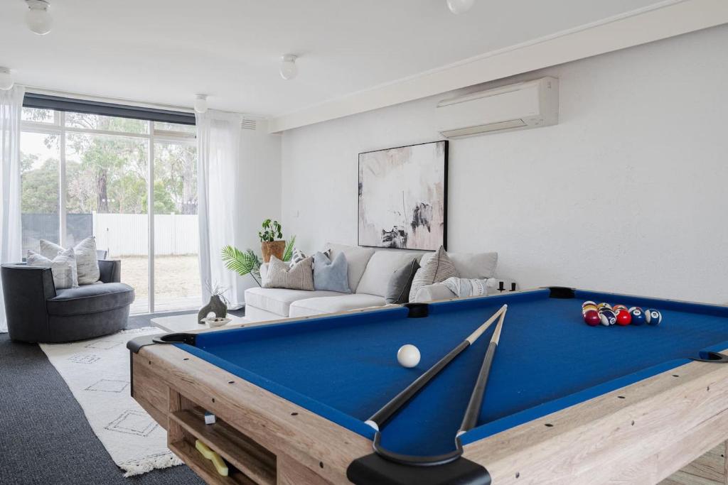 a living room with a pool table at Uncover Mount Eliza's Charm from this Local Stay in Mount Eliza