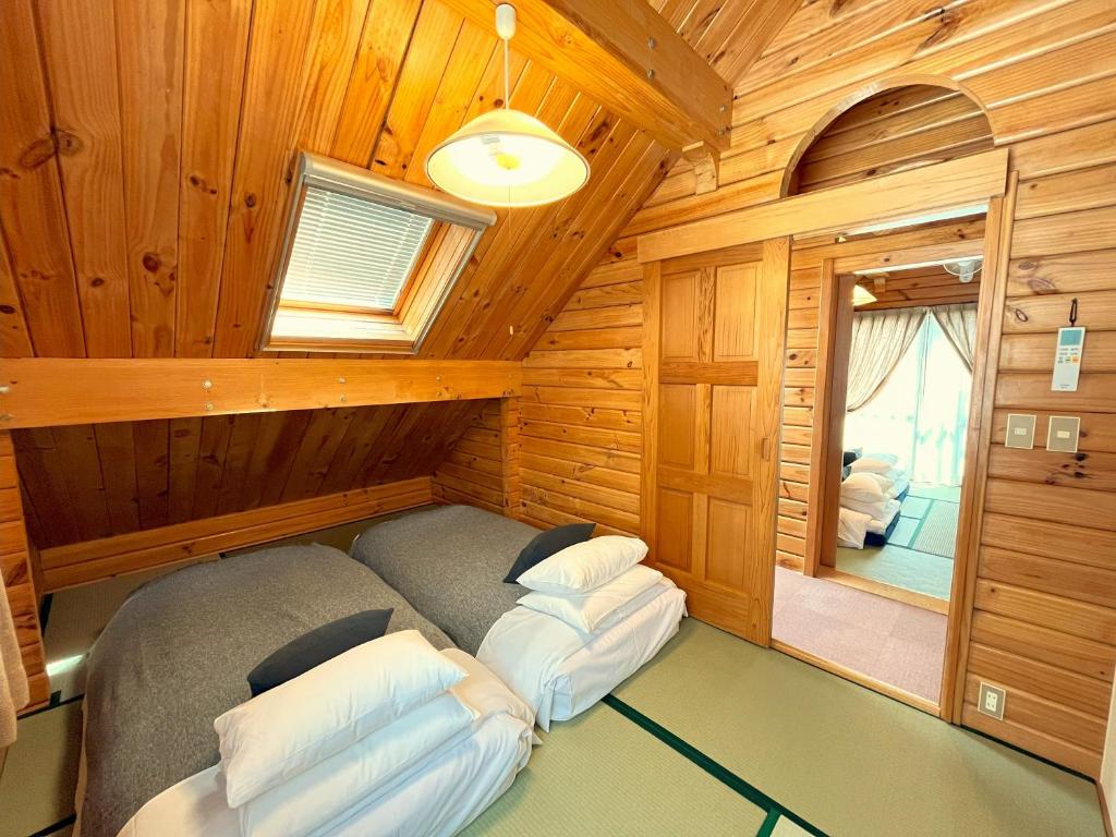 Posezení v ubytování Log Cottage Epoch