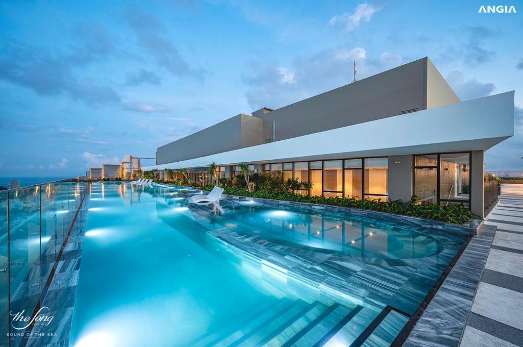 a swimming pool on the roof of a building at Milan Homestay - The Song Vung Tau in Vung Tau