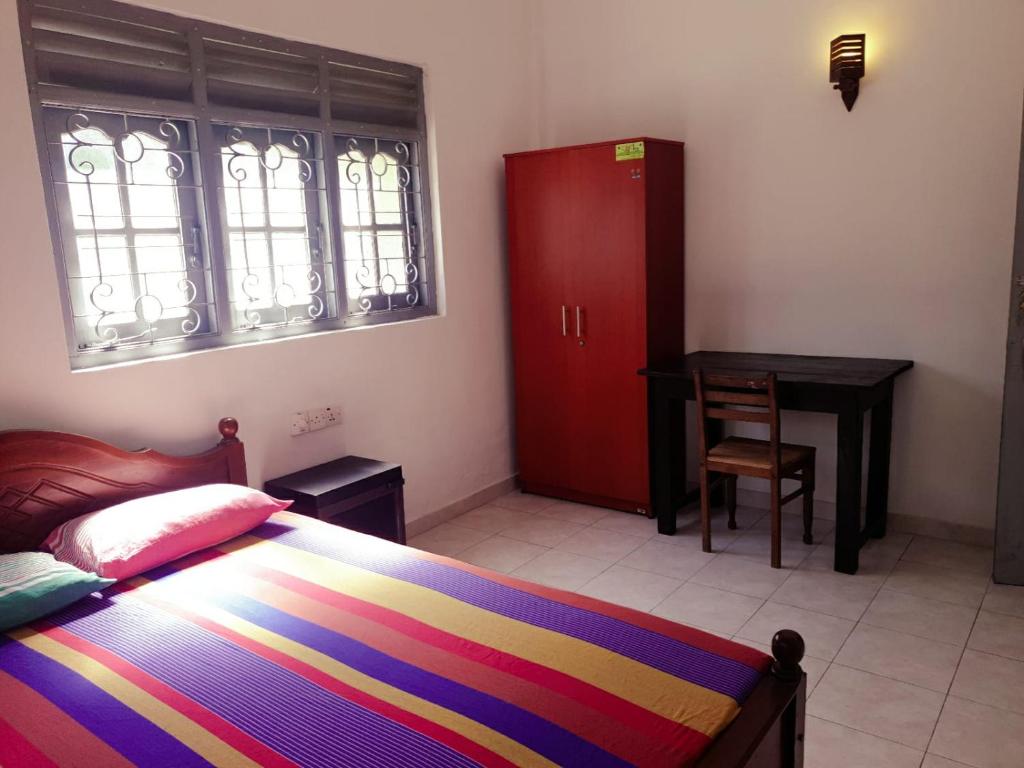 Llit o llits en una habitació de Susha Hostel