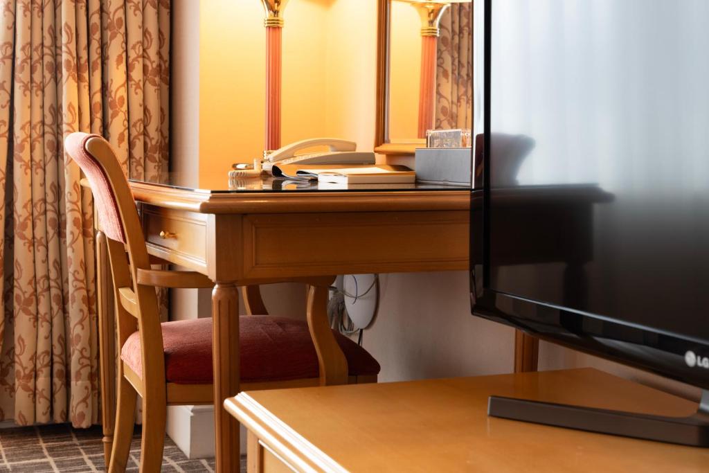 TV a/nebo společenská místnost v ubytování Lotte Hotel Busan