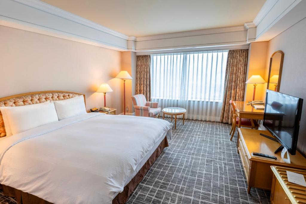 TV a/nebo společenská místnost v ubytování Lotte Hotel Busan