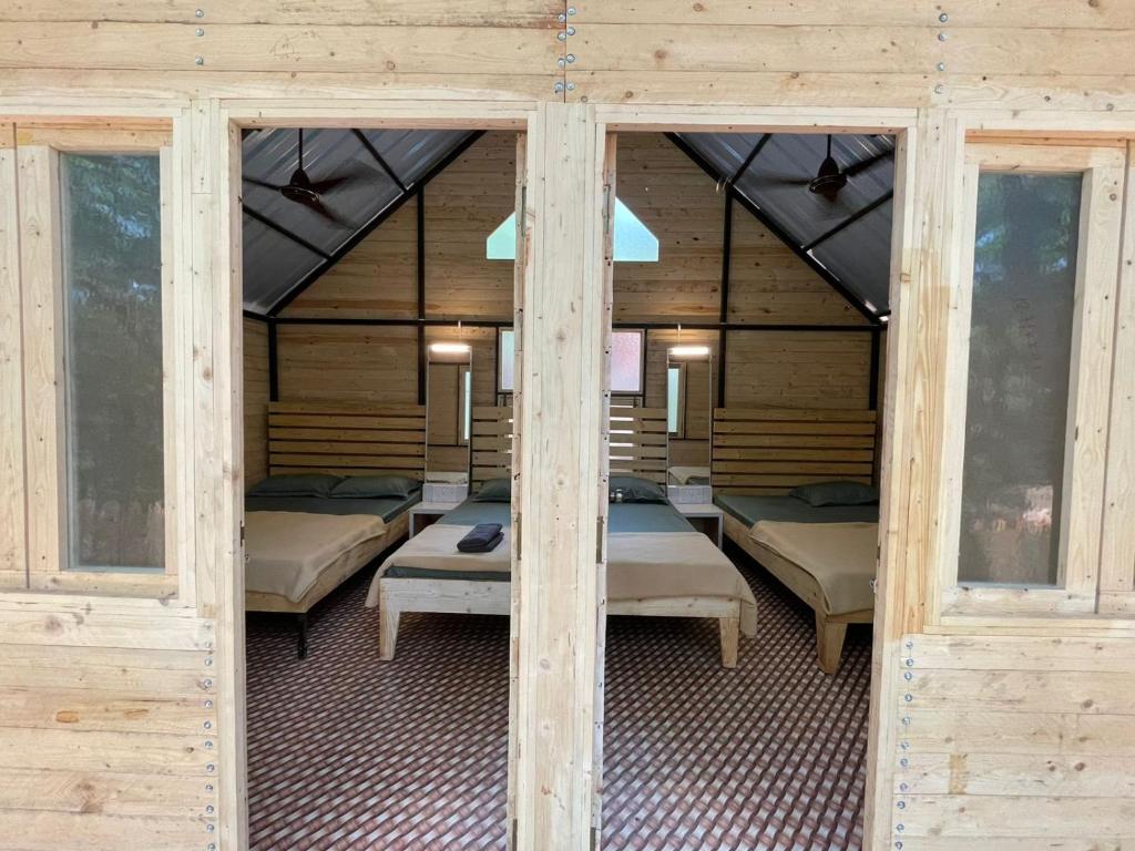 Postel nebo postele na pokoji v ubytování Nature Glamping