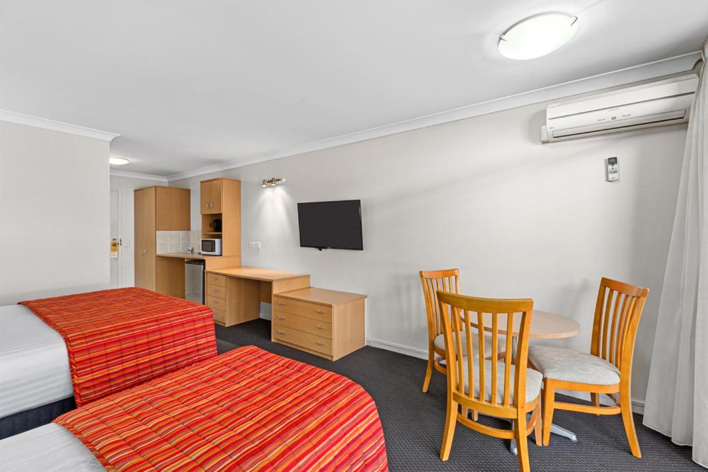 TV a/nebo společenská místnost v ubytování Comfort Inn Grammar View