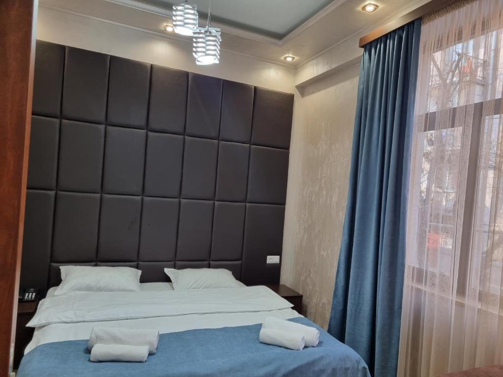 Postel nebo postele na pokoji v ubytování Day Inn hotel