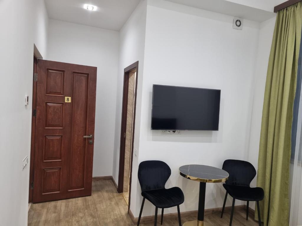 TV a/nebo společenská místnost v ubytování Day Inn hotel