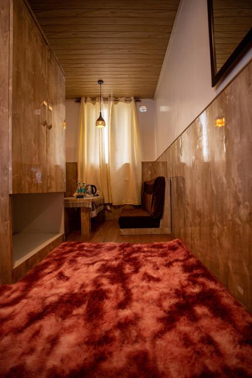 Posezení v ubytování Darjeeling Guest House Deluxe