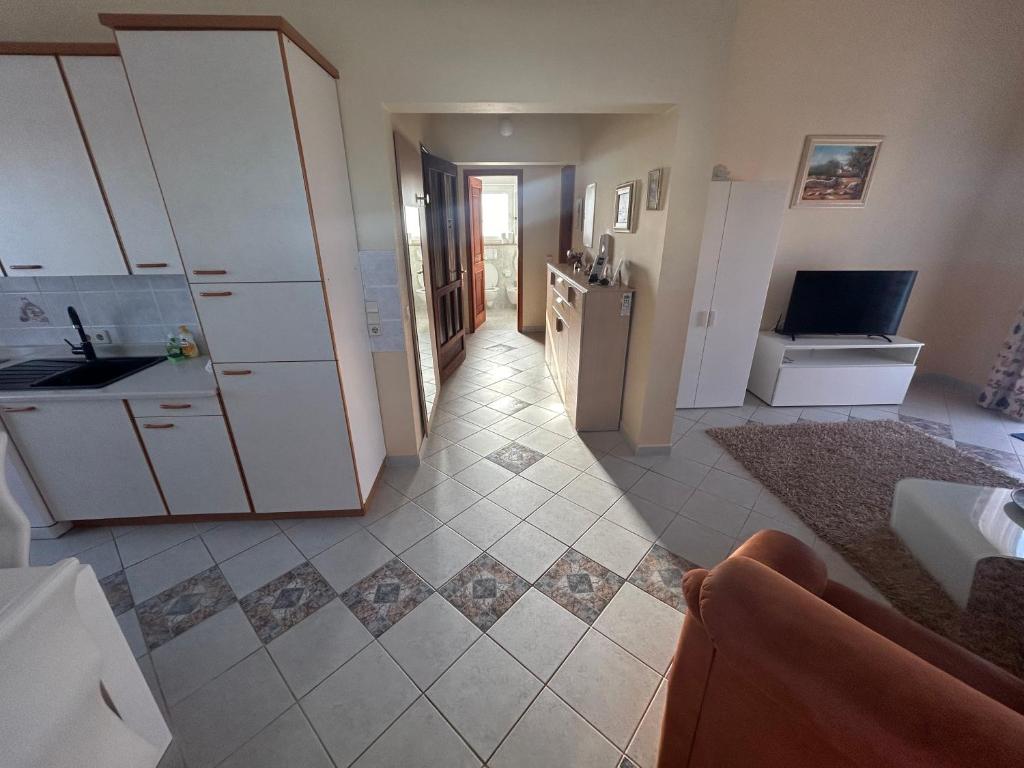 TV a/nebo společenská místnost v ubytování Casa Cino