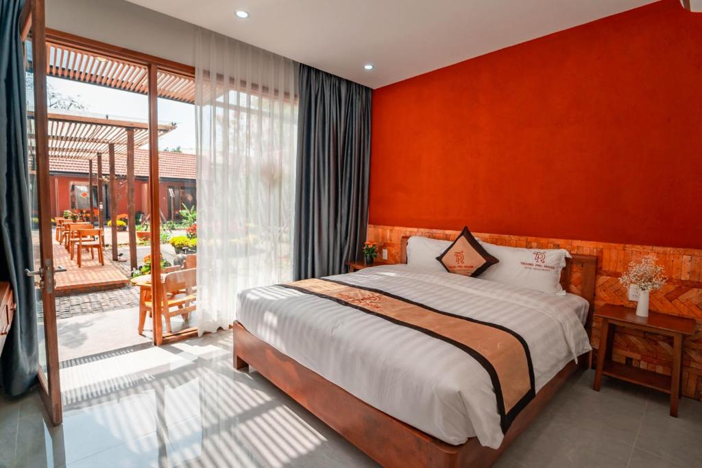 Giường trong phòng chung tại TRUONG PHU HOUSE - HOTEL &amp; APARTMENT