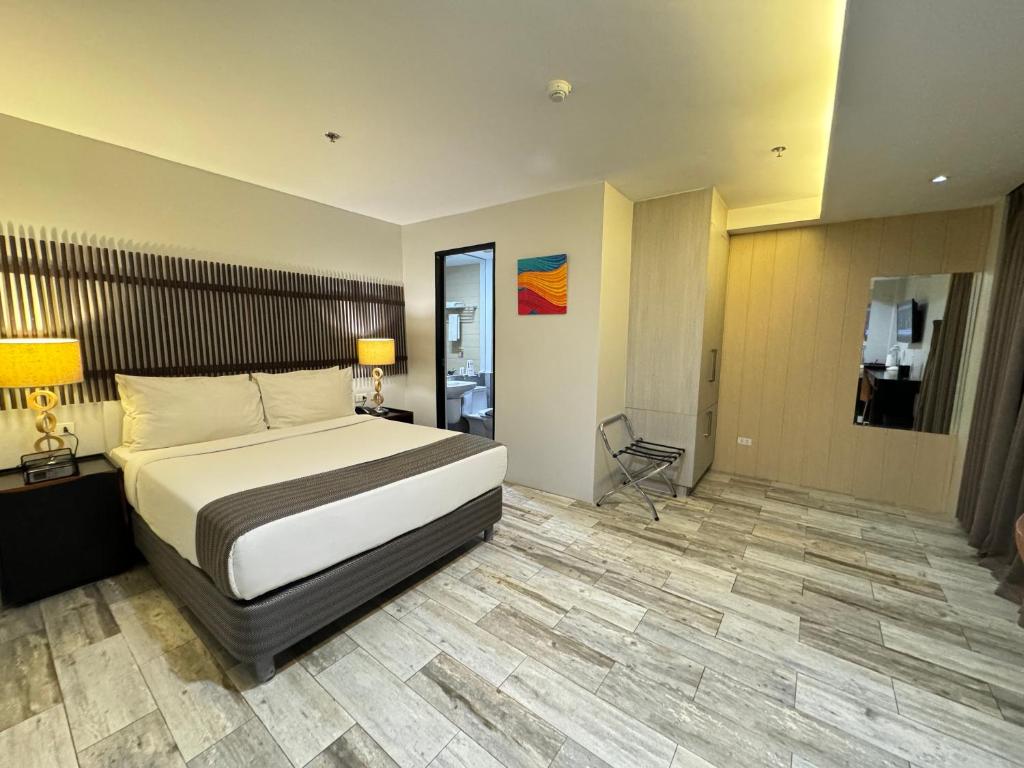 Postel nebo postele na pokoji v ubytování 1A Express Hotel