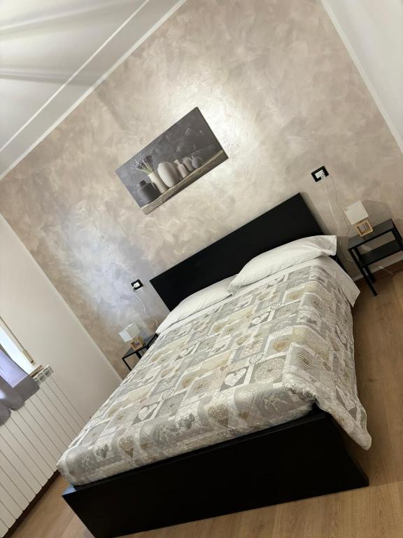 Postel nebo postele na pokoji v ubytování Agriturismo B&B La Cerasa