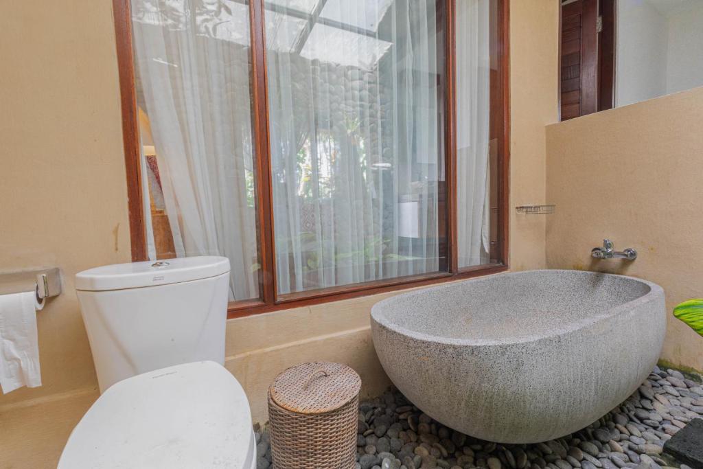 Koupelna v ubytování Gopala Villa Ubud